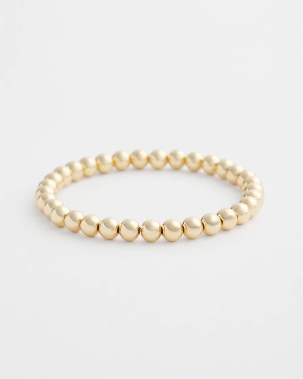 Small Beaded Gold Tone Stretch Bracelet